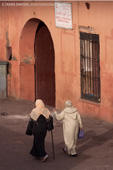 Women walking through Djemma el Fna